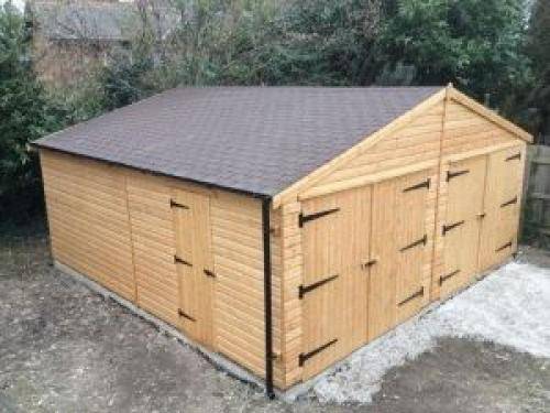 Из какого материла дешевле построить гараж?