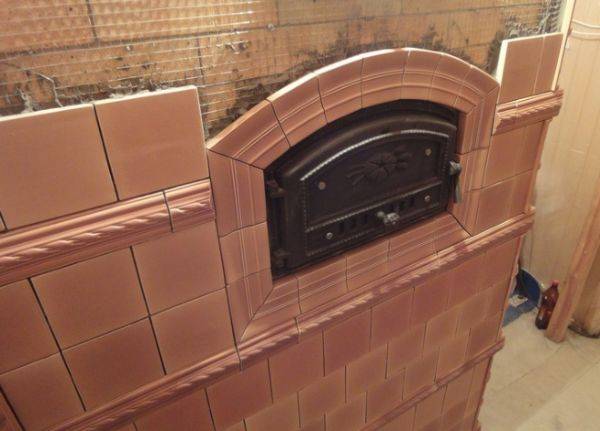 Облицовка печи керамической плиткой своими руками: способы монтажа